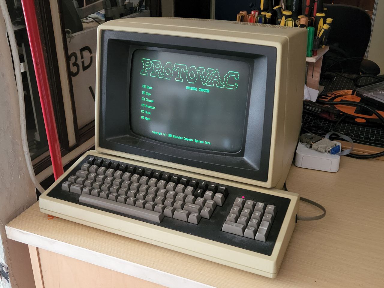 and old CRT screen from 1983 with a keyboard infront of it
